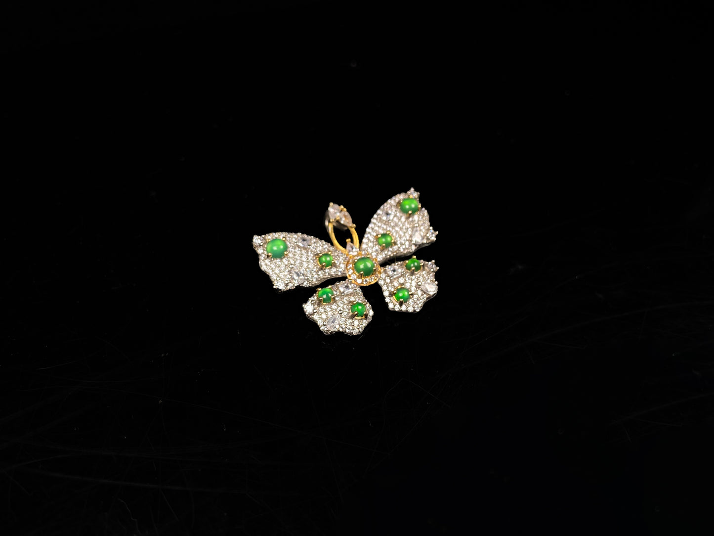 A green butterfly sparkle jadeite pendant.