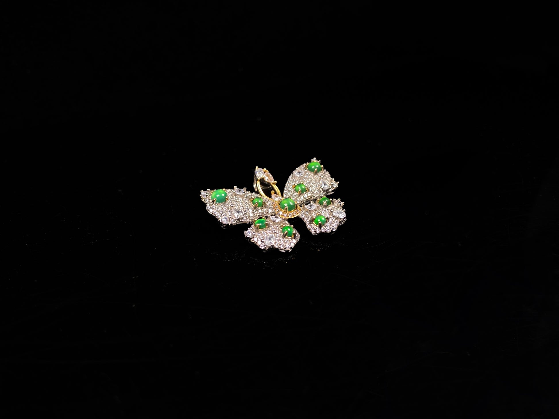 A green butterfly sparkle jadeite pendant.