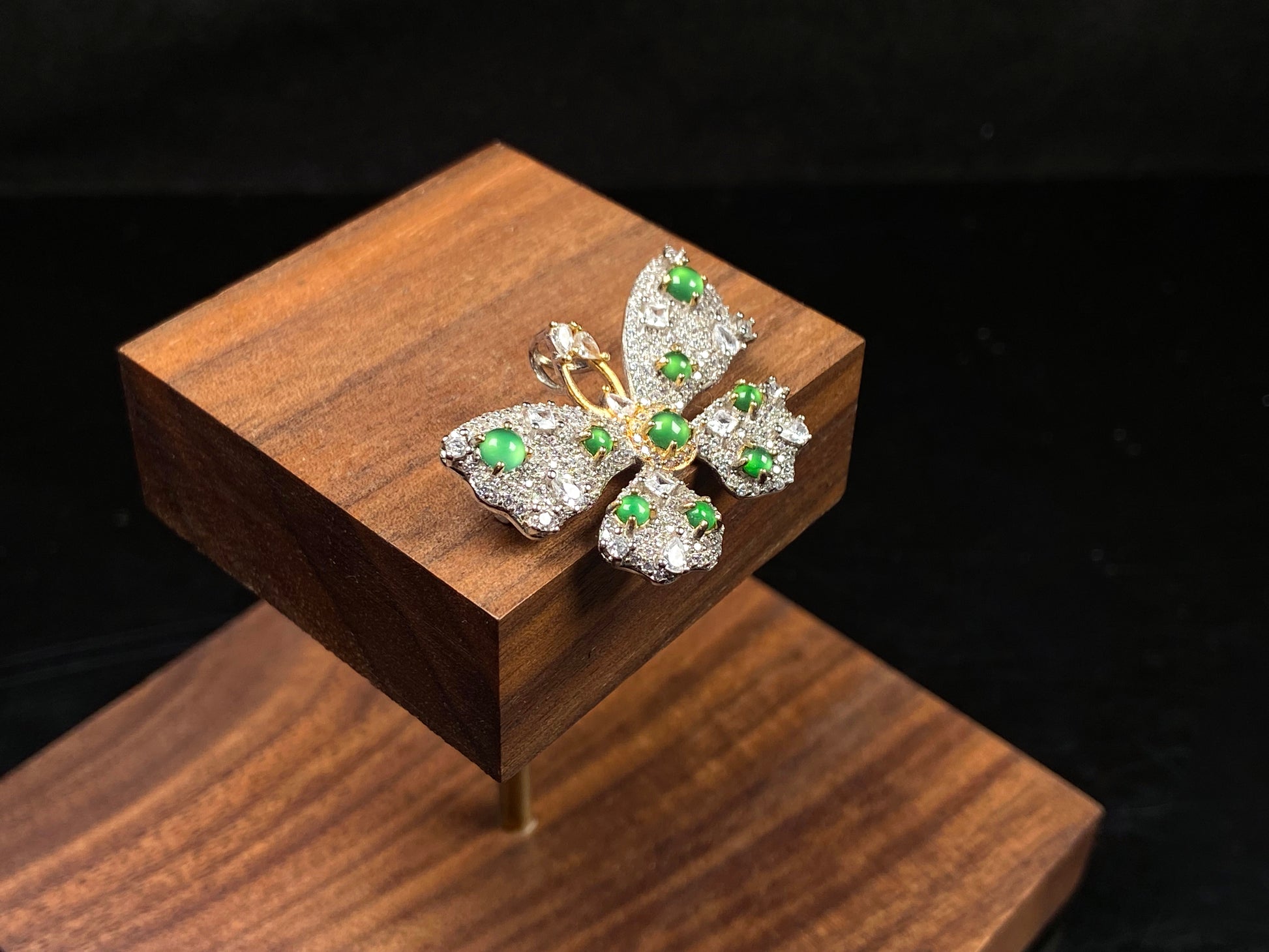 A green butterfly sparkle jadeite pendant.