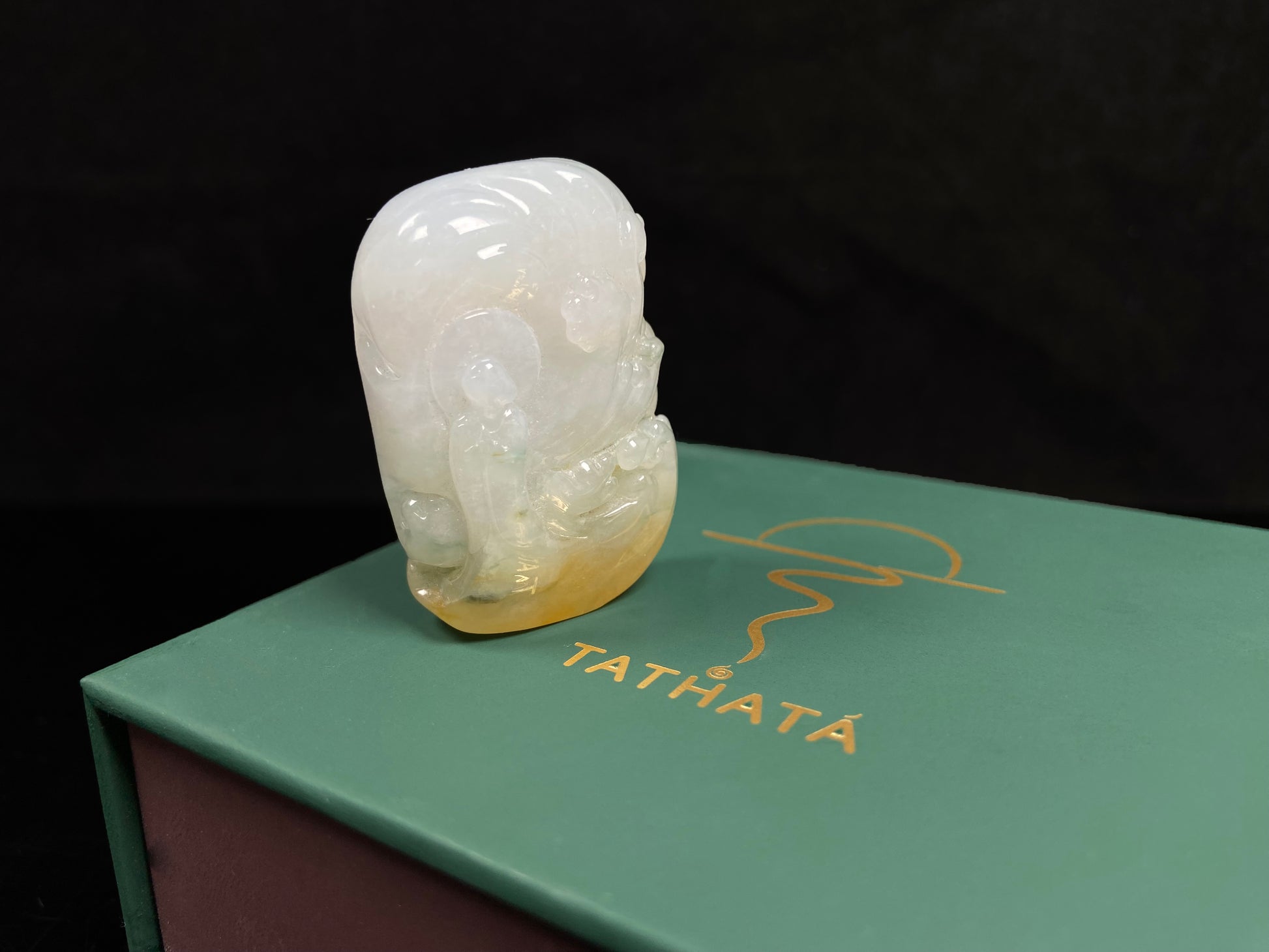 A auspicious yellow white buddha loose jadeite.