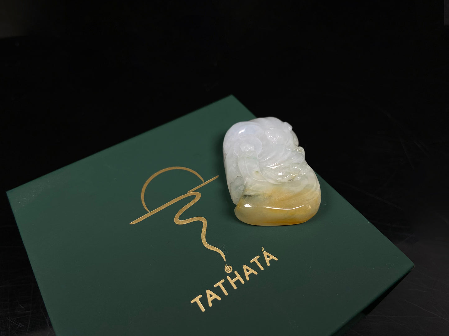A auspicious yellow white buddha loose jadeite.