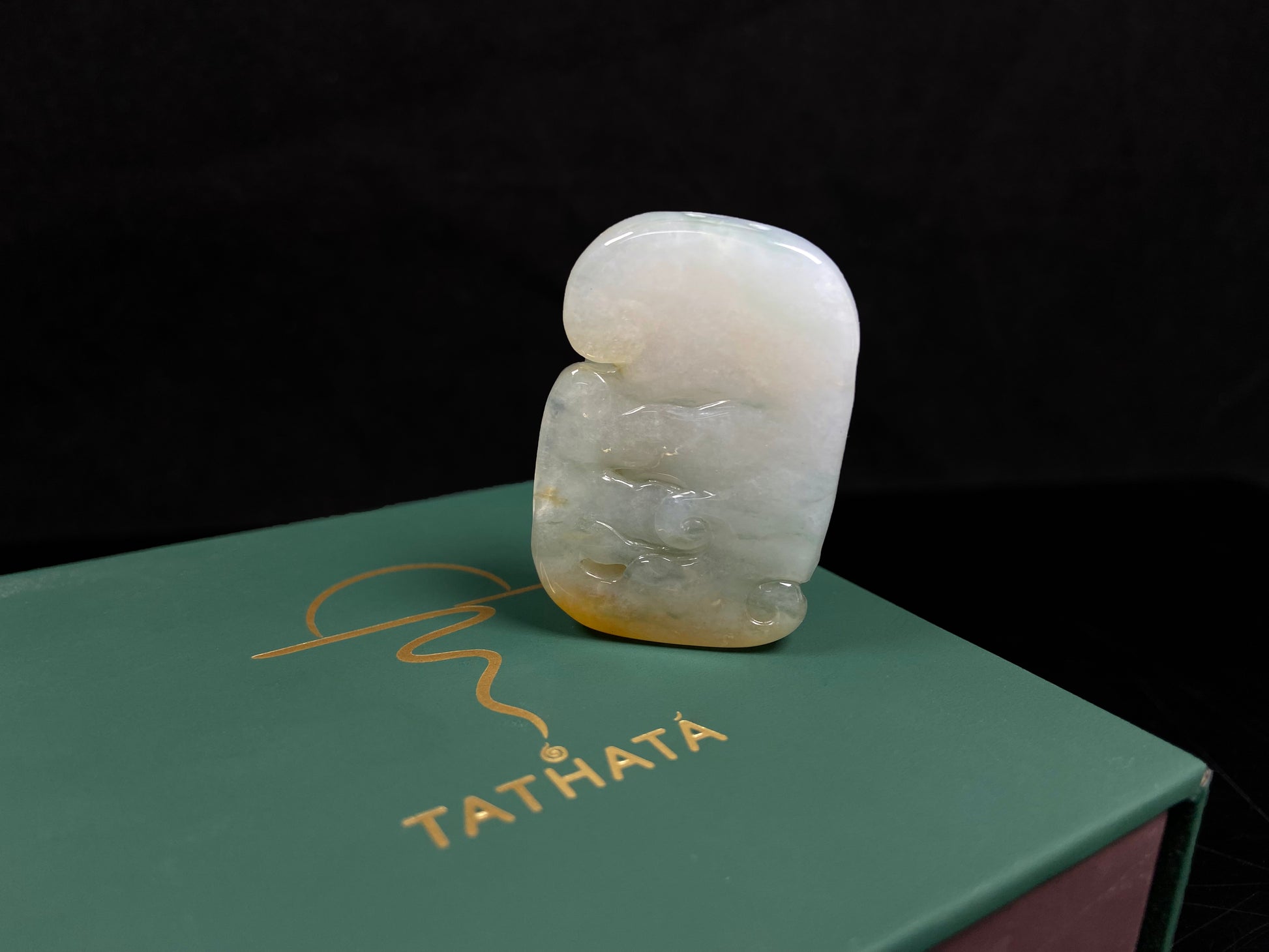 A auspicious yellow white buddha loose jadeite.