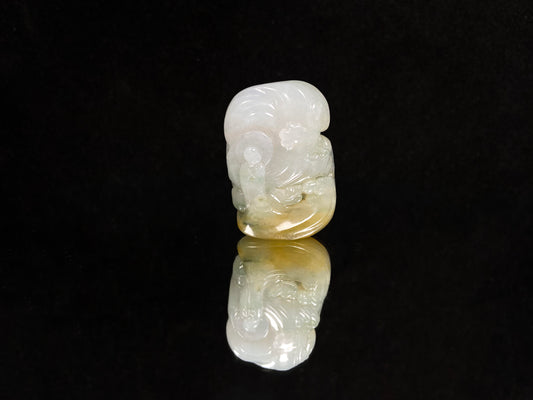A auspicious yellow white buddha loose jadeite.