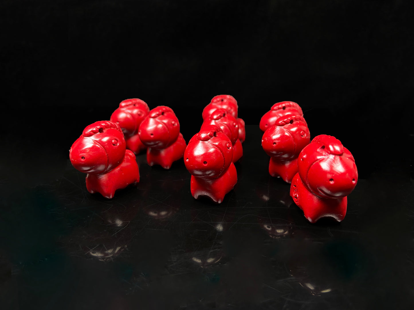 A red cute fortune cinnabar horse group.