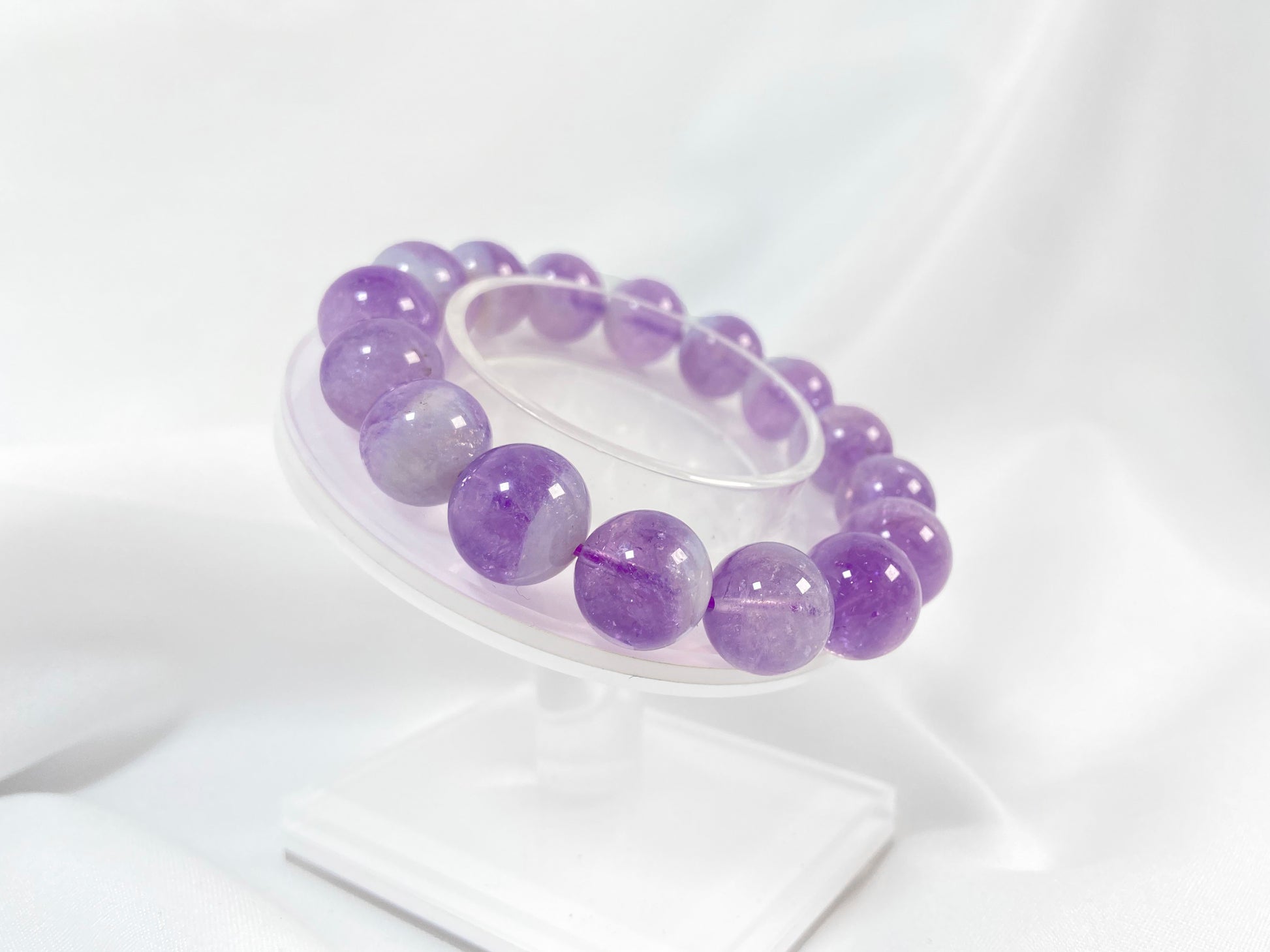 This bracelet features genuine amethyst beads.