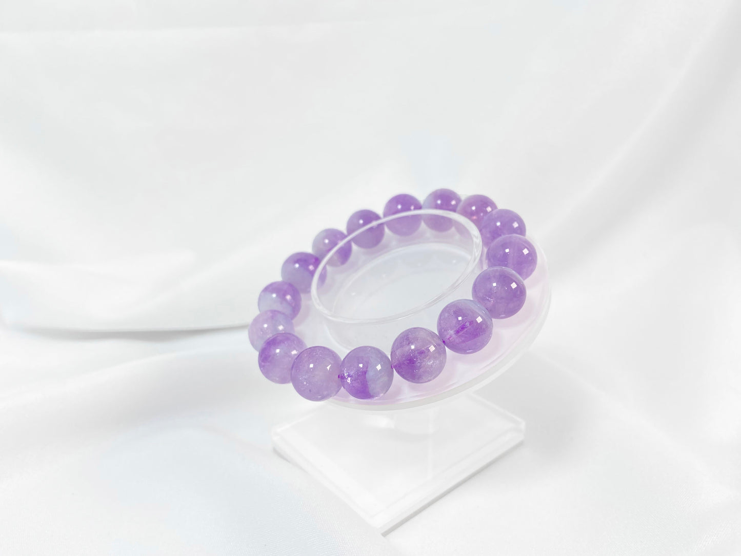 This bracelet features genuine amethyst beads.