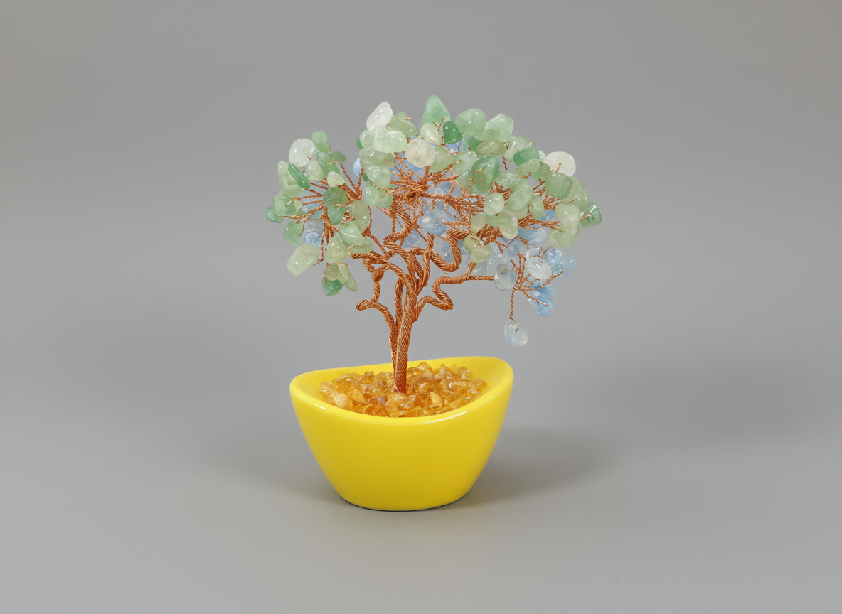 Decorative tree with blue and green leaves in a yellow pot on a white background