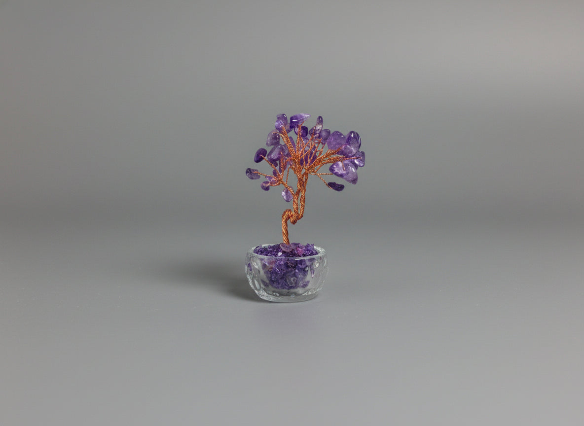A small potted Amethyst crystal tree.