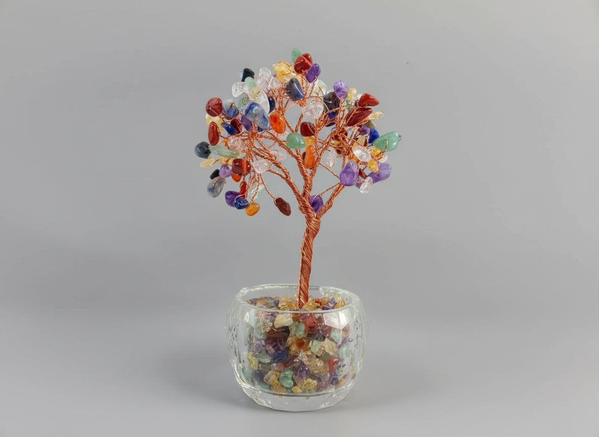 A crystal tree made with amethyst, citrine, green crystal, red crystal, and rose quartz.