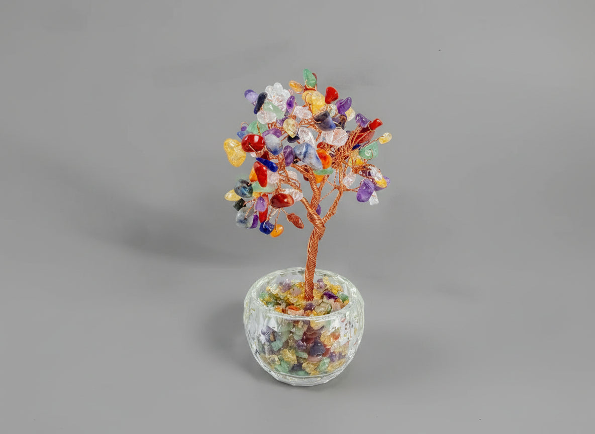A crystal tree made with amethyst, citrine, green crystal, red crystal, and rose quartz.