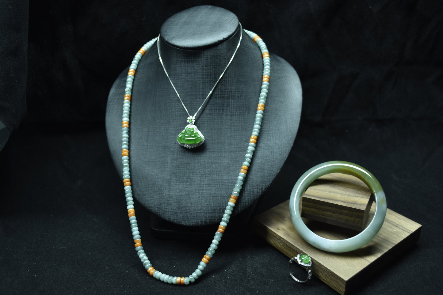 Jewelry set with necklace and bracelet on a dark background