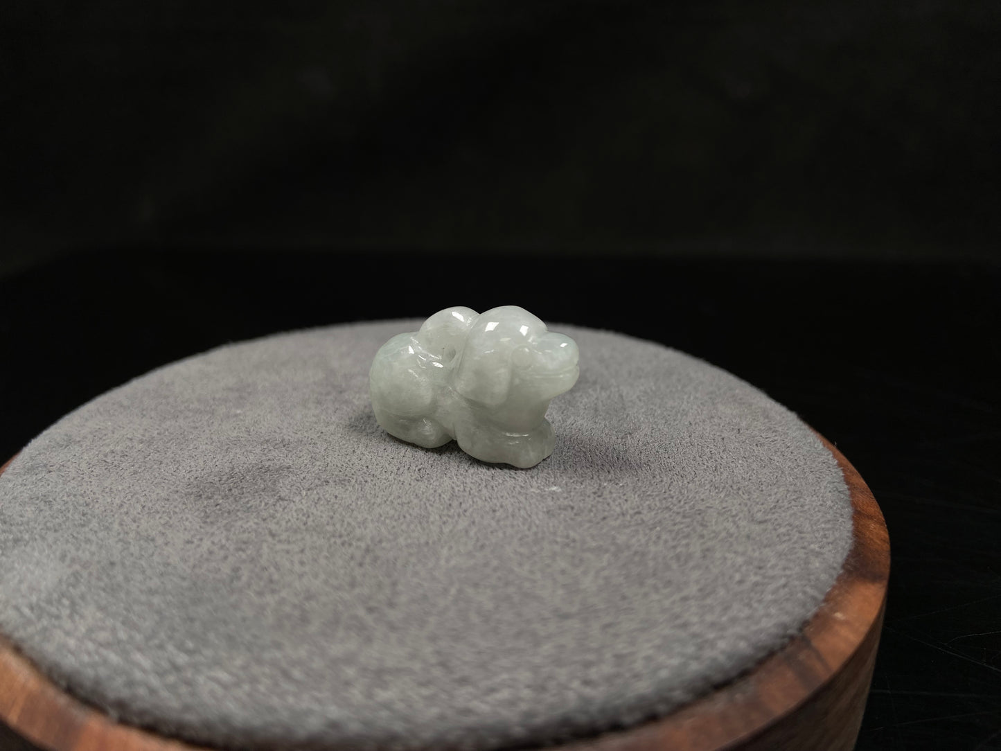 A translucent pale white dog loose jadeite.