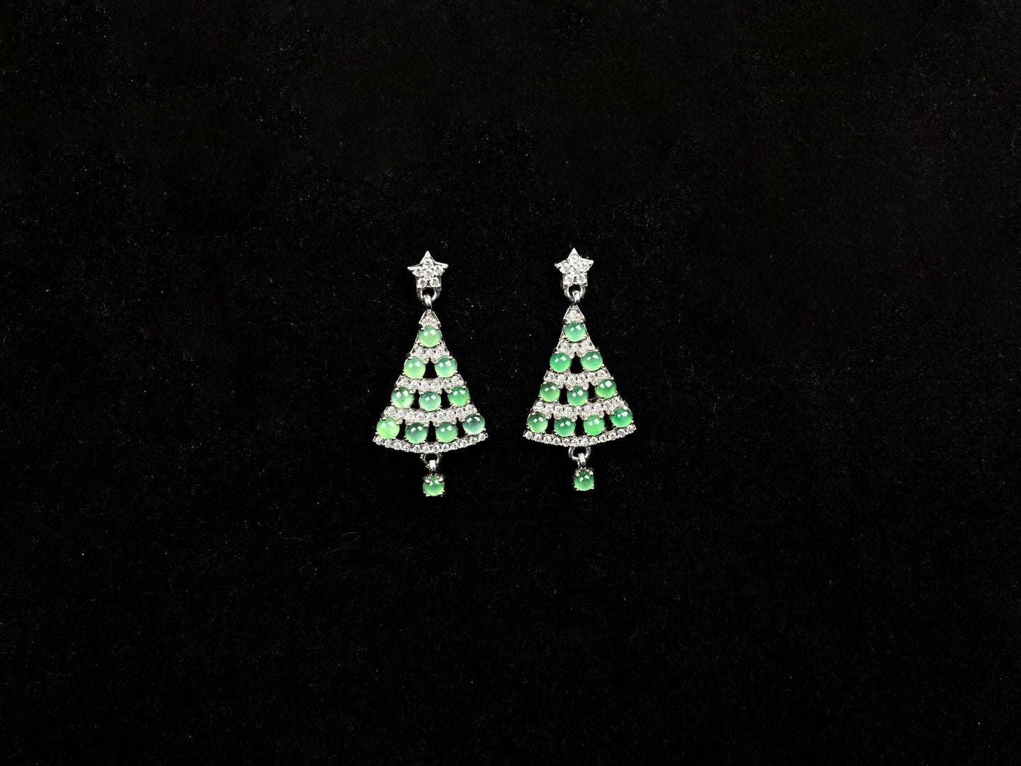 A pair of  lucky green christmas tree jadeite earrings.