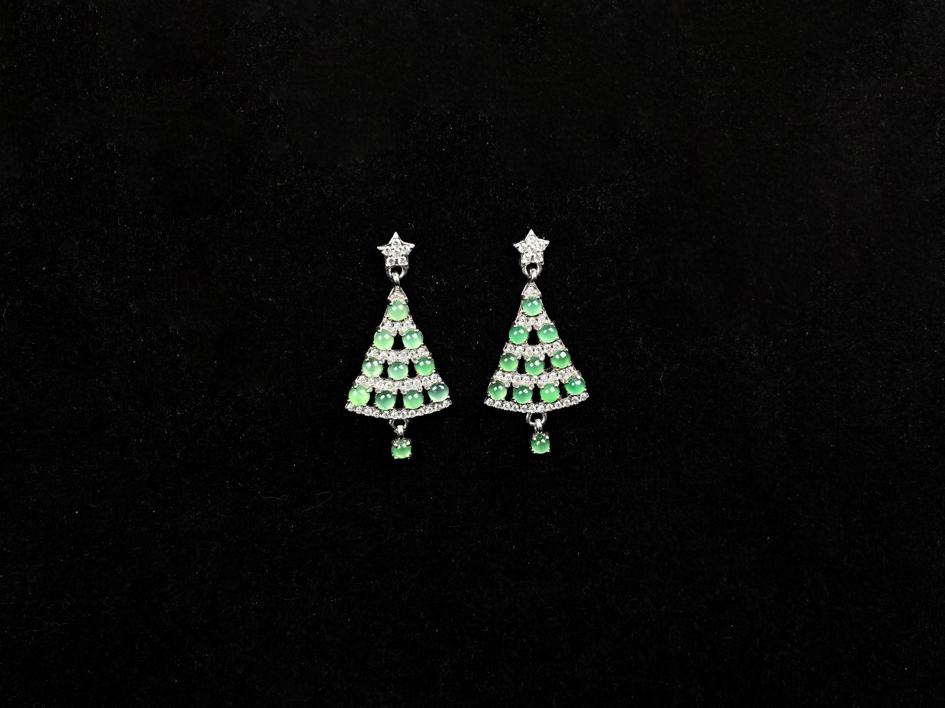 A pair of  lucky green christmas tree jadeite earrings.