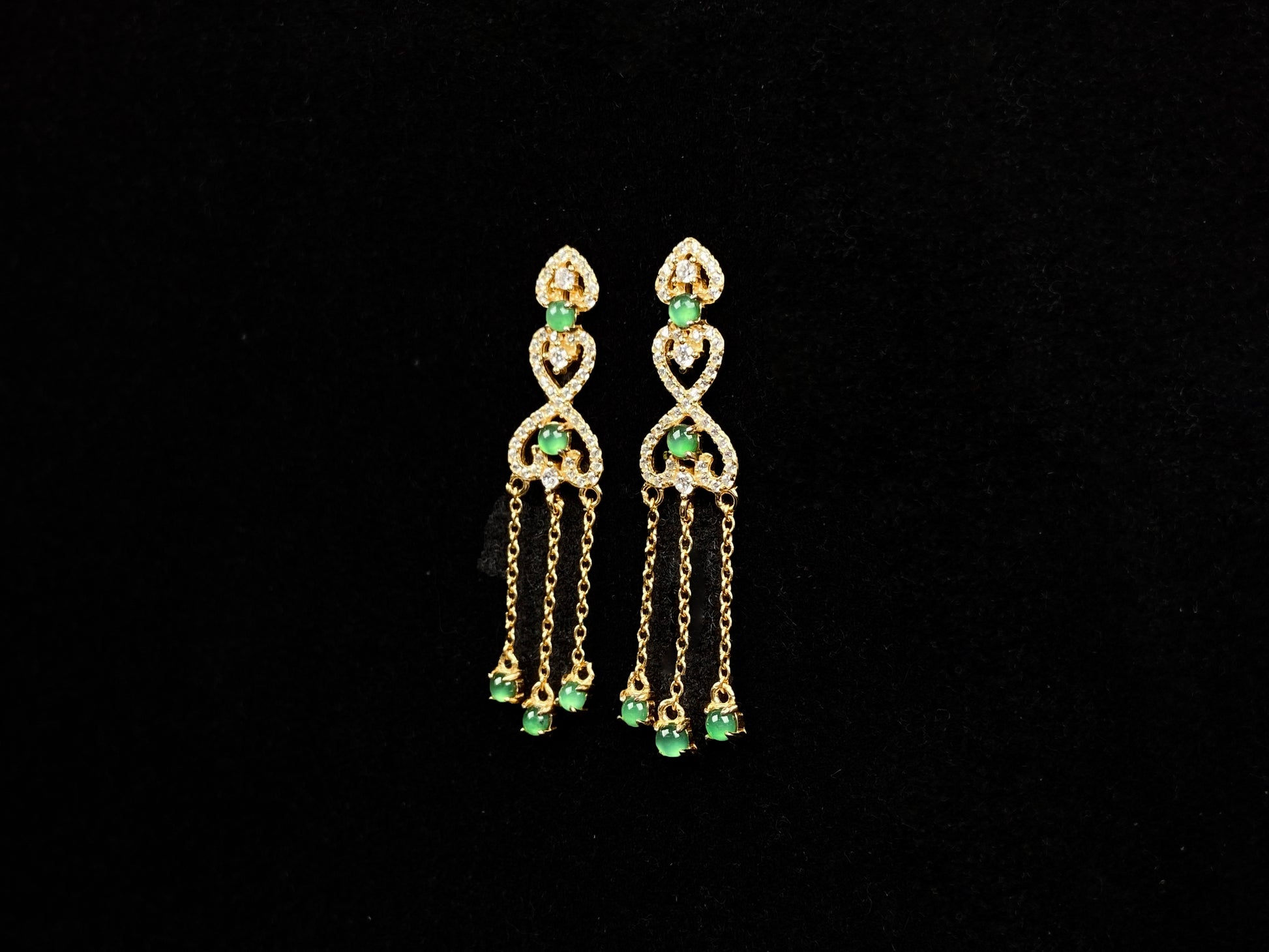 A pair of double heart green tassel  jadeite earrings.
