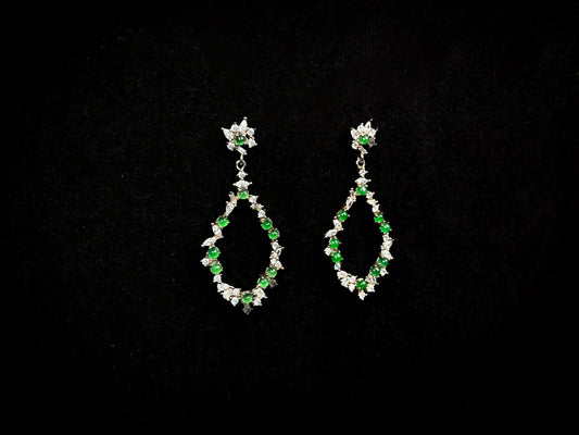 A green teardrop garland jadeite earrings.