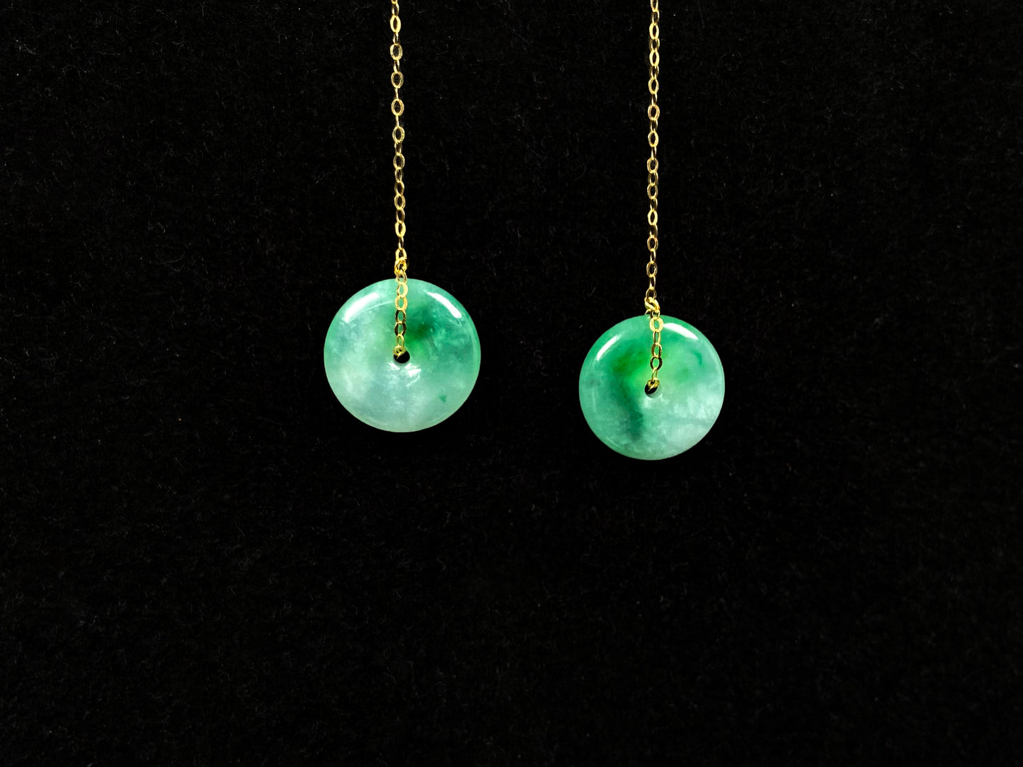 A peaceful green Ping An Kou jadeite earring.