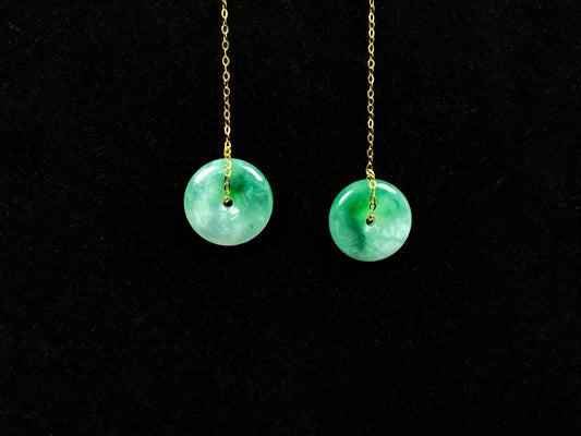 A peaceful green Ping An Kou jadeite earring.