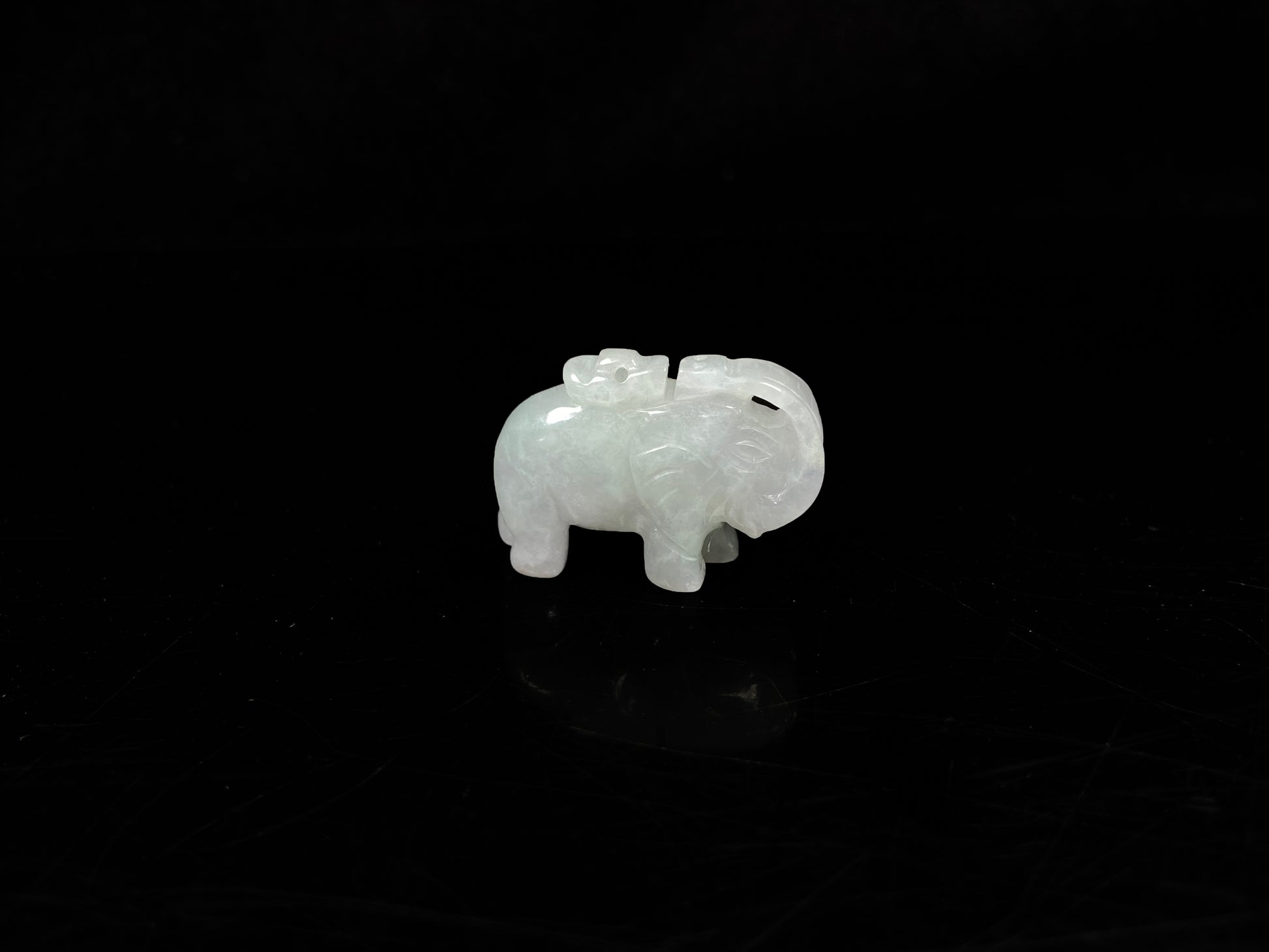 A icy white lucky elephant blessing  loose jadeite.