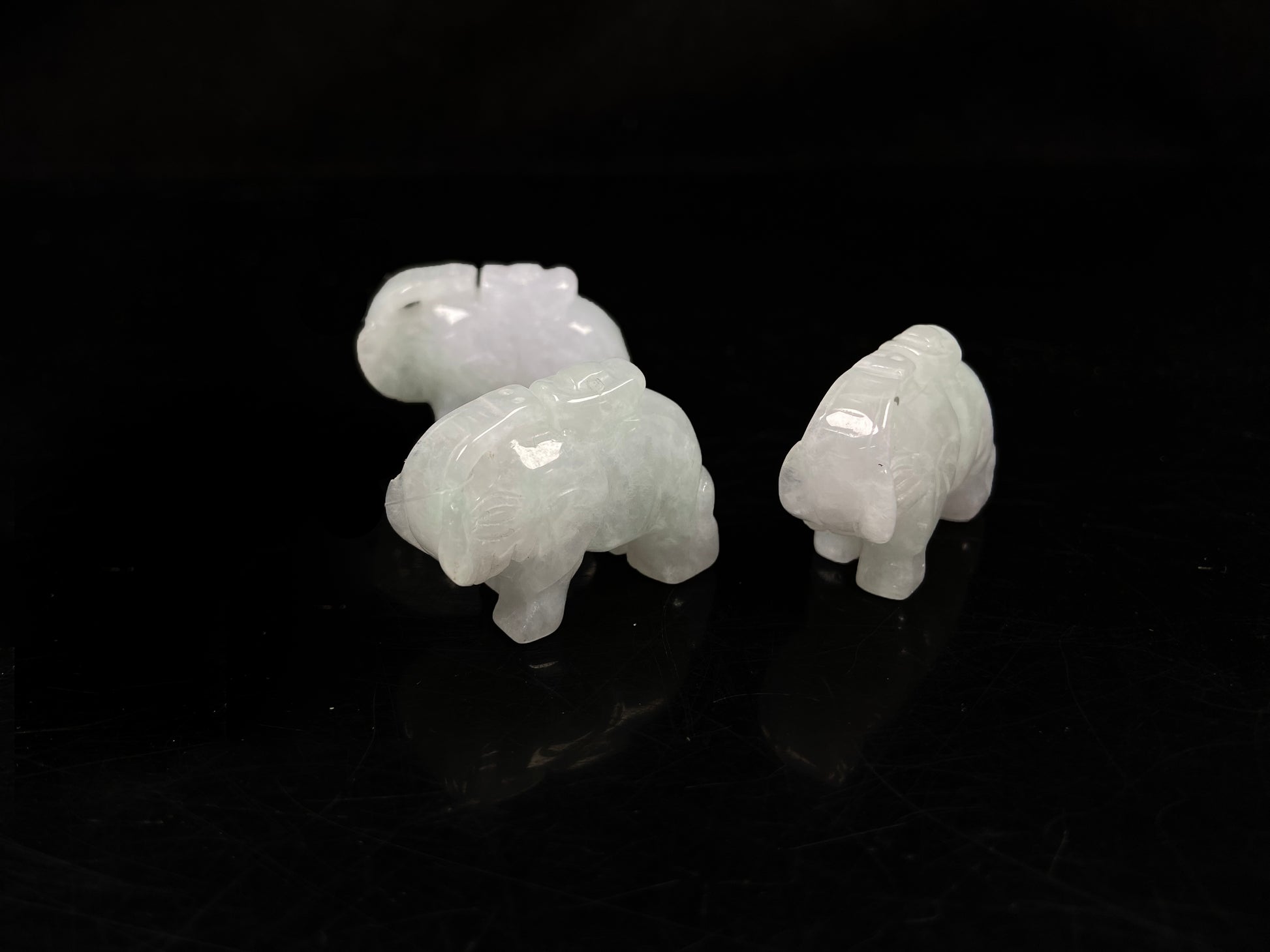 A icy white lucky elephant blessing  loose jadeite.