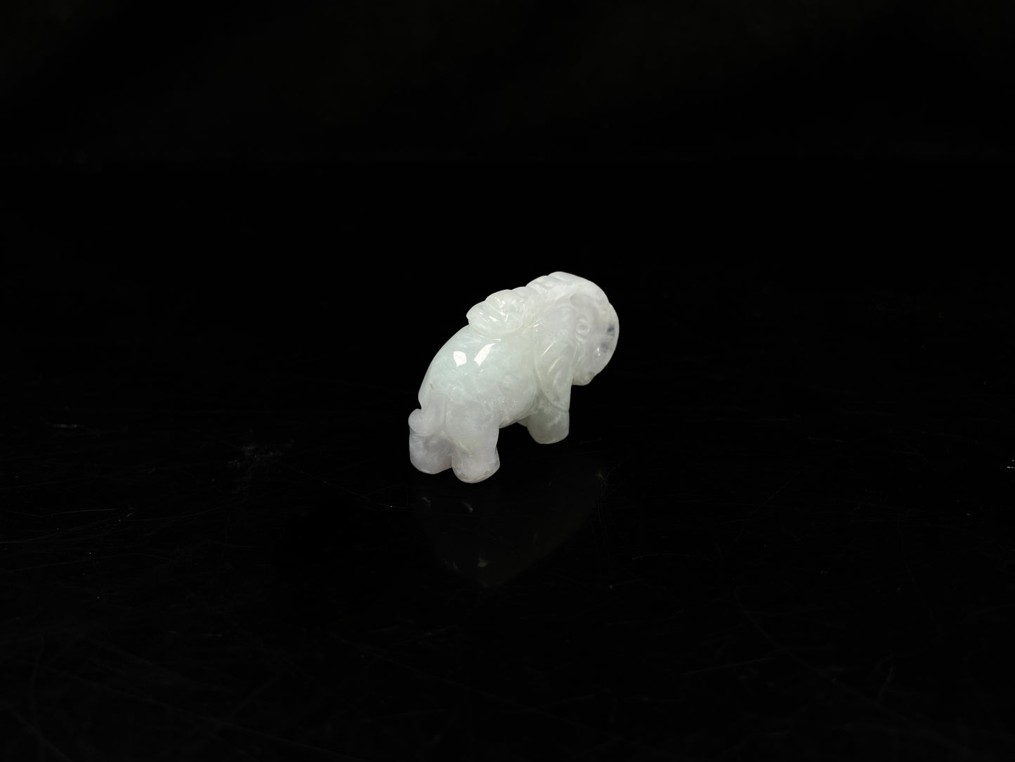 A icy white lucky elephant blessing  loose jadeite.