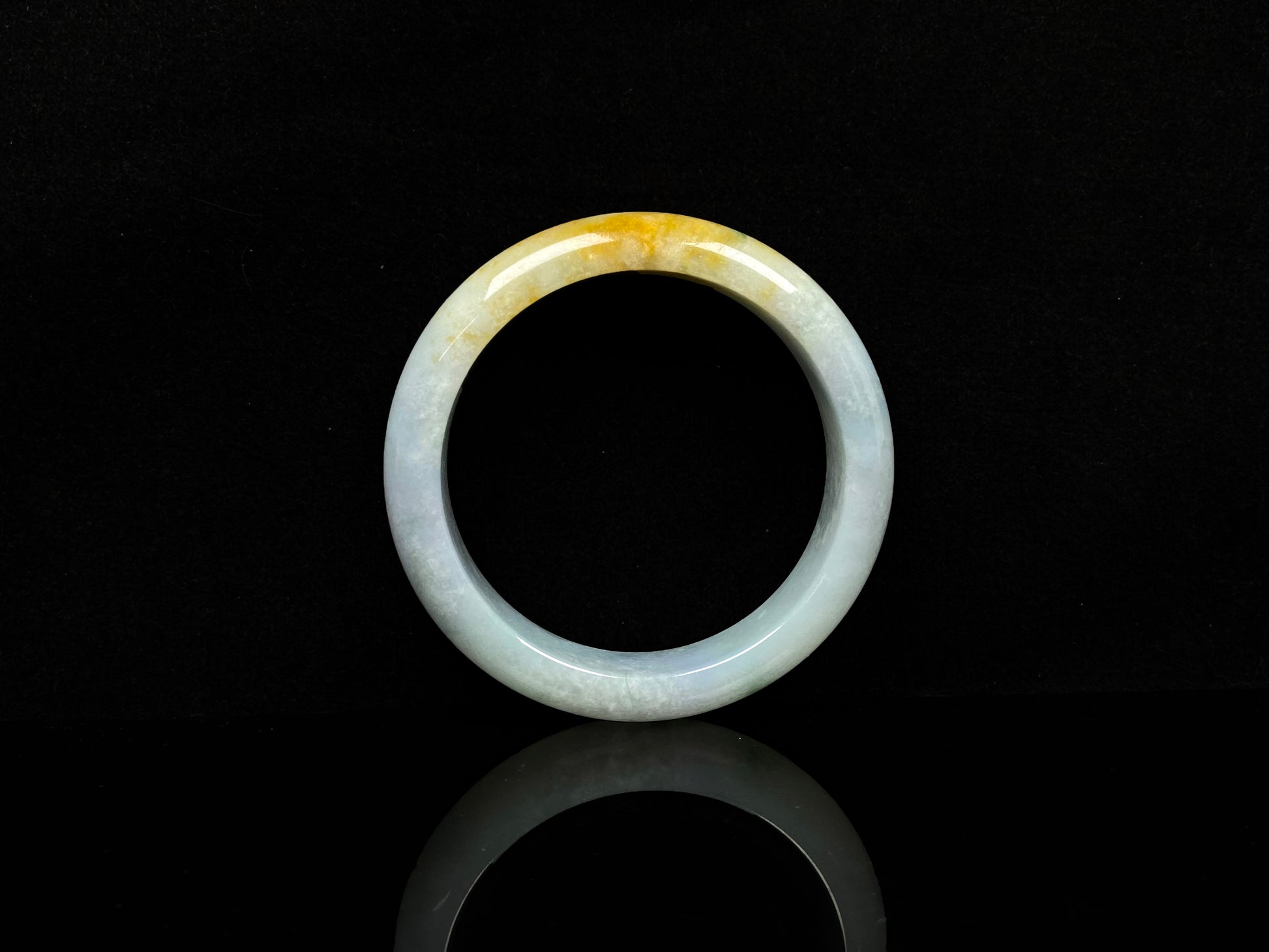 A fire phoenix jadeite bangle.