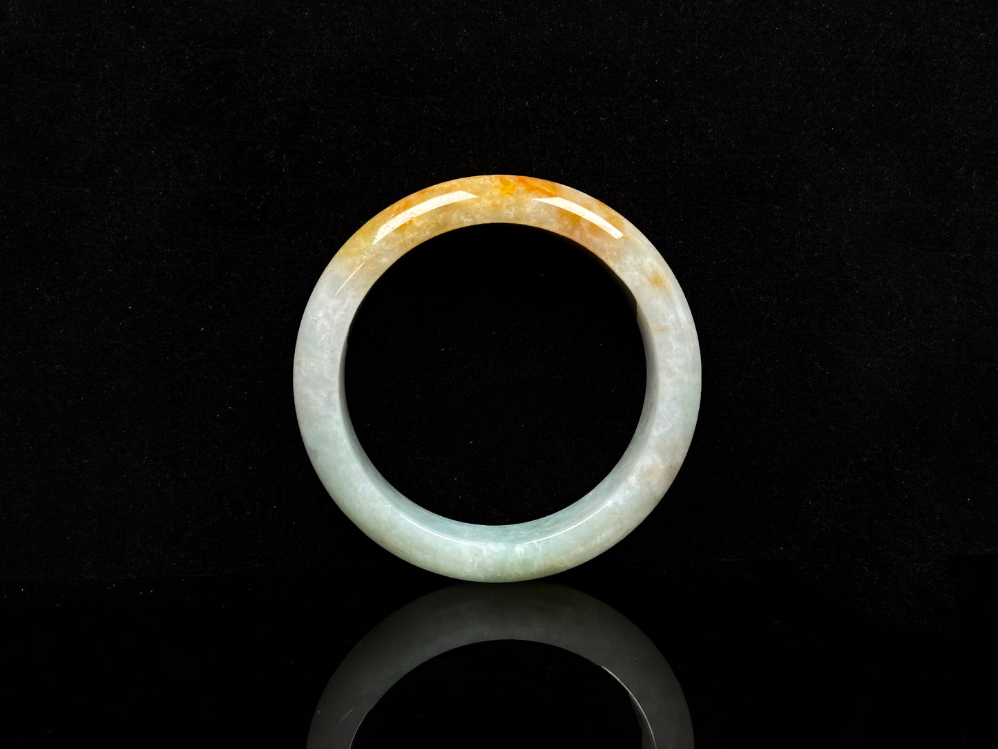 A fire phoenix jadeite bangle.