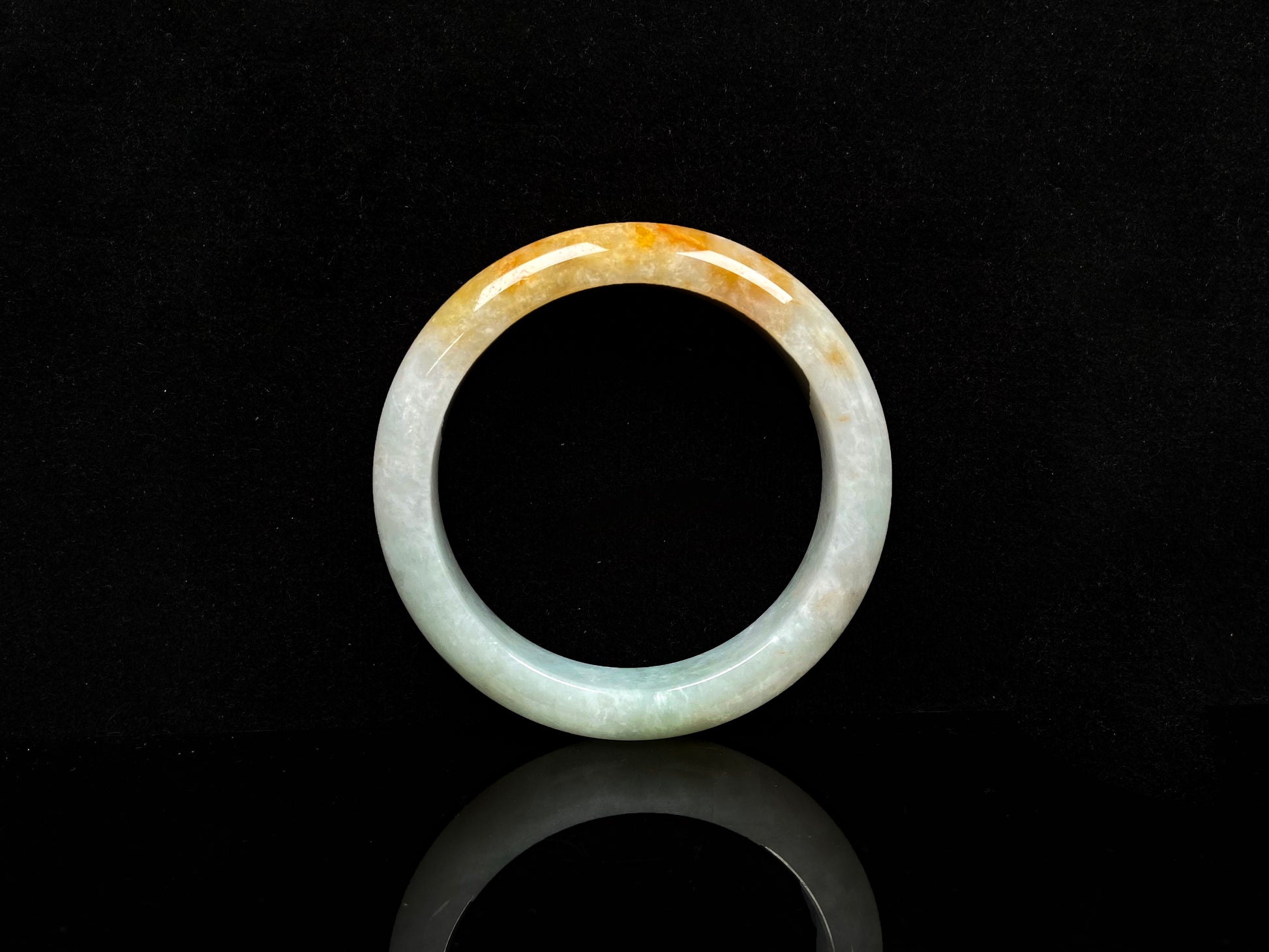 A fire phoenix jadeite bangle.