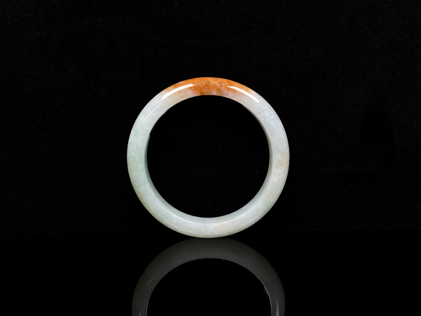 A fire phoenix jadeite bangle.