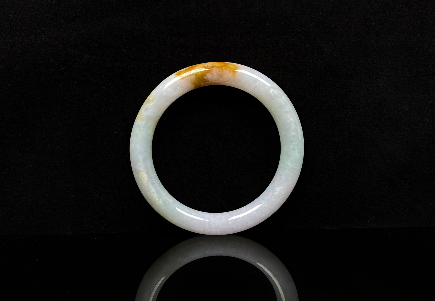A fire phoenix jadeite bangle.