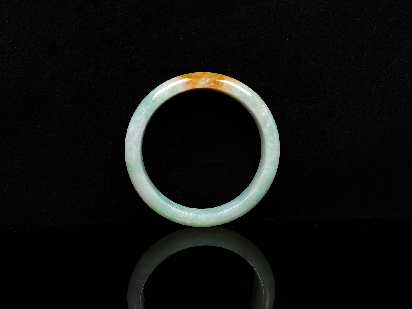 A fire phoenix jadeite bangle.