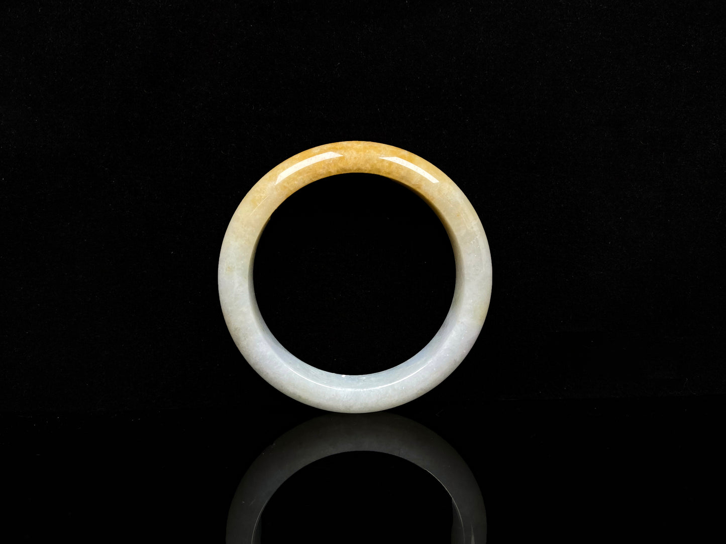 A fire phoenix jadeite bangle.