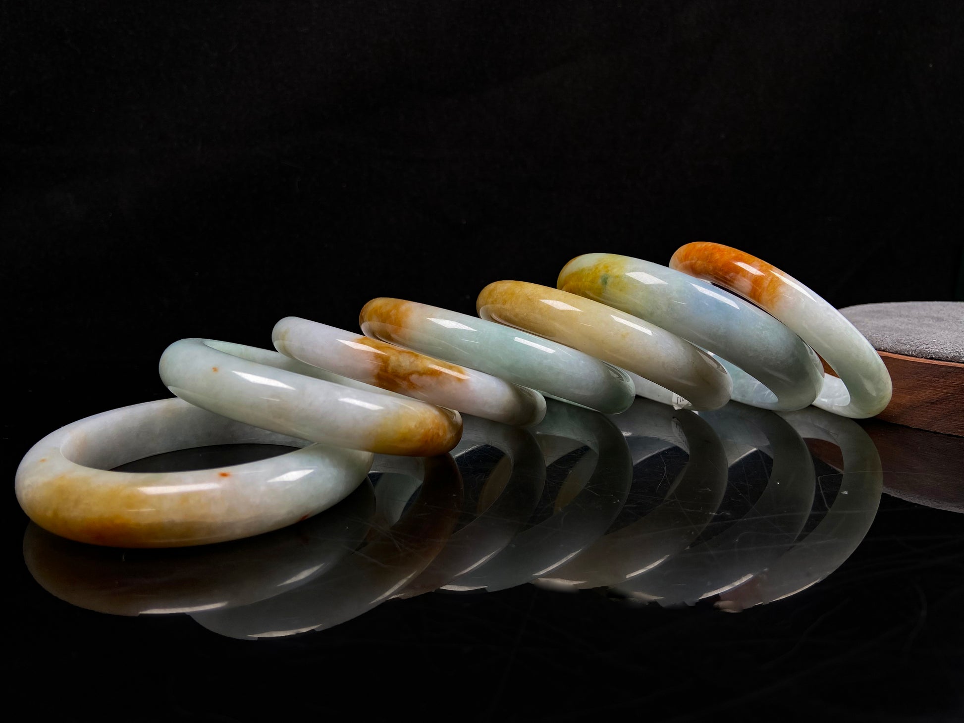A fire phoenix jadeite bangle group.
