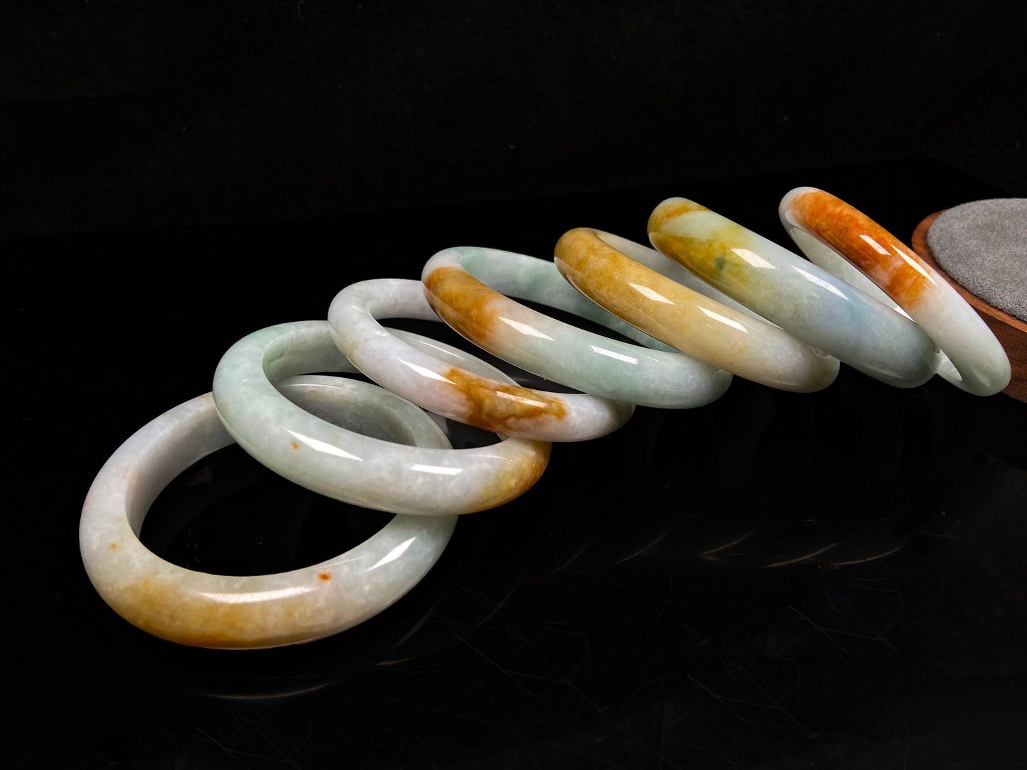 A fire phoenix jadeite bangle group.