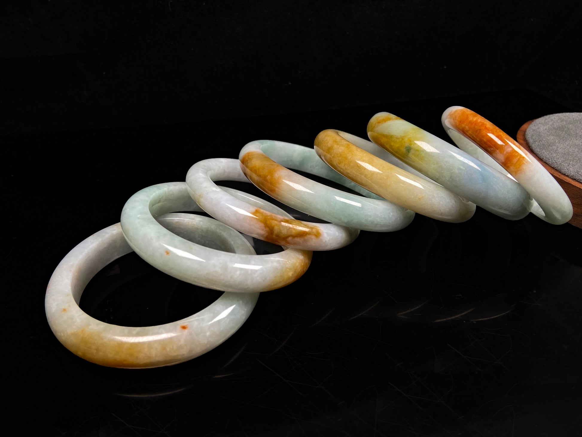 A fire phoenix jadeite bangle group.