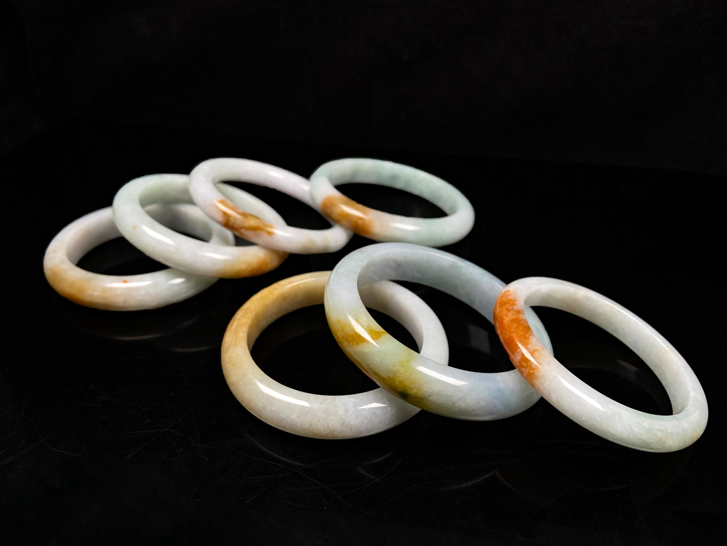A fire phoenix jadeite bangle group.