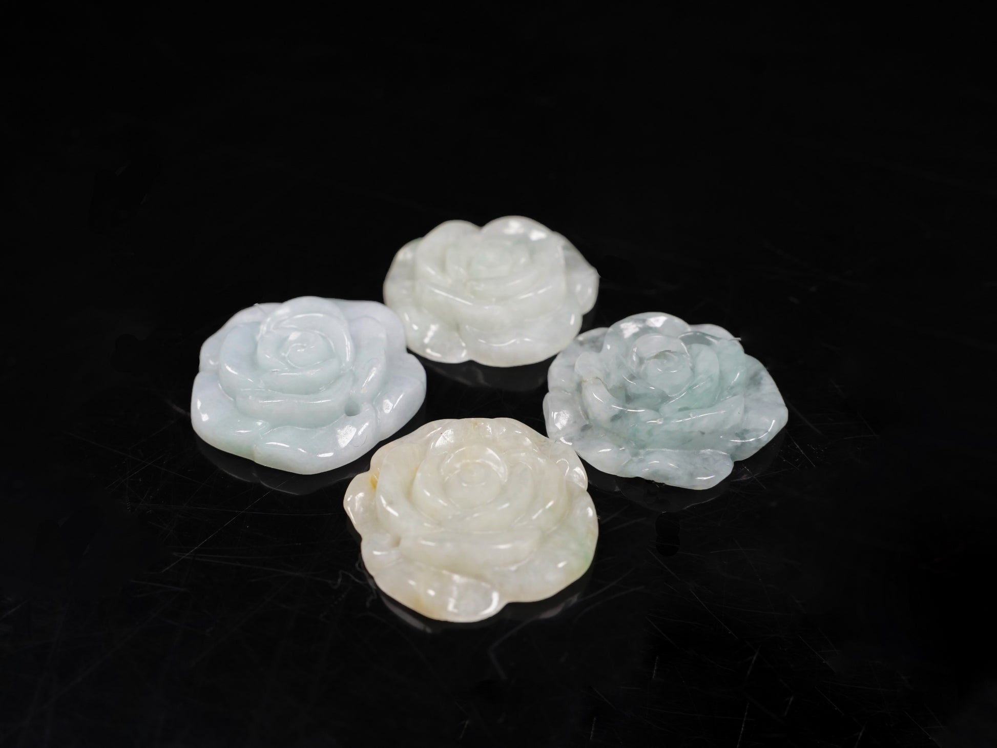 Four individually colored blooms loose jadeite.