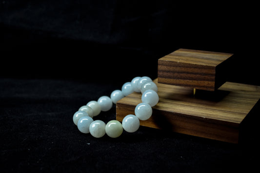 Glistening Snowflakes — A String of Jadeite Beads