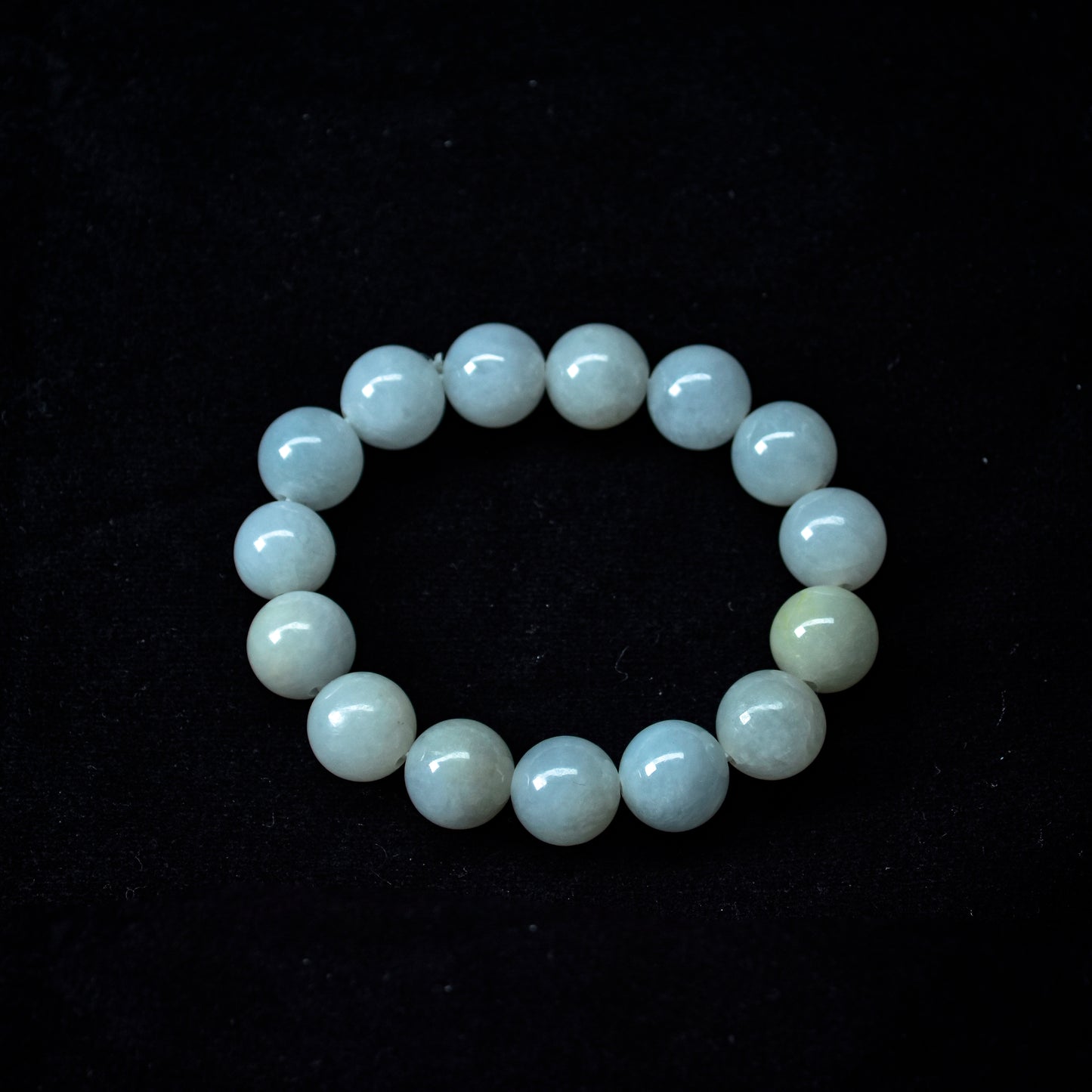 Glistening Snowflakes — A String of Jadeite Beads