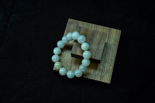 Glistening Snowflakes — A String of Jadeite Beads