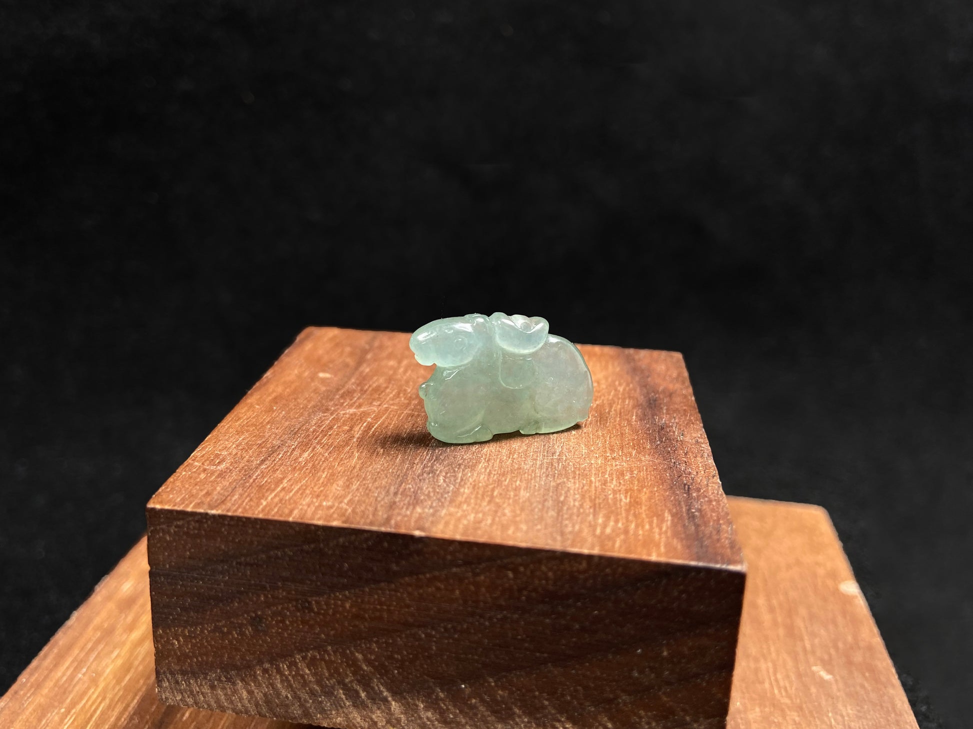 A wispy mint green horse loose jadeite.