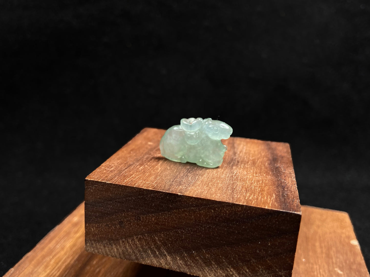 A wispy mint green horse loose jadeite.