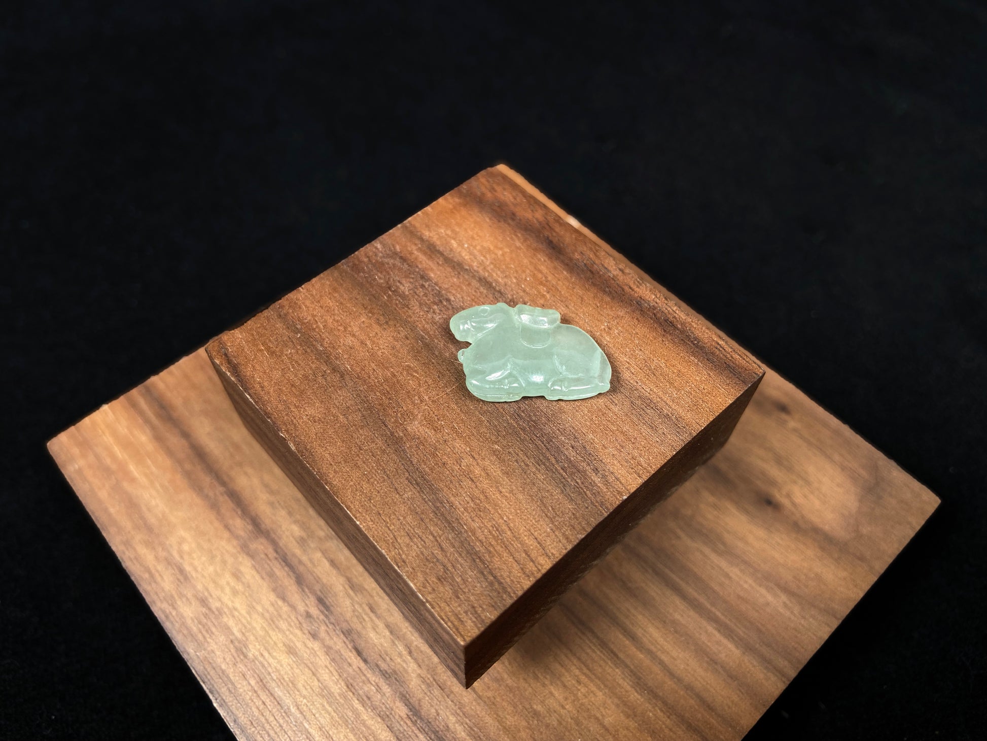 A wispy mint green horse loose jadeite.