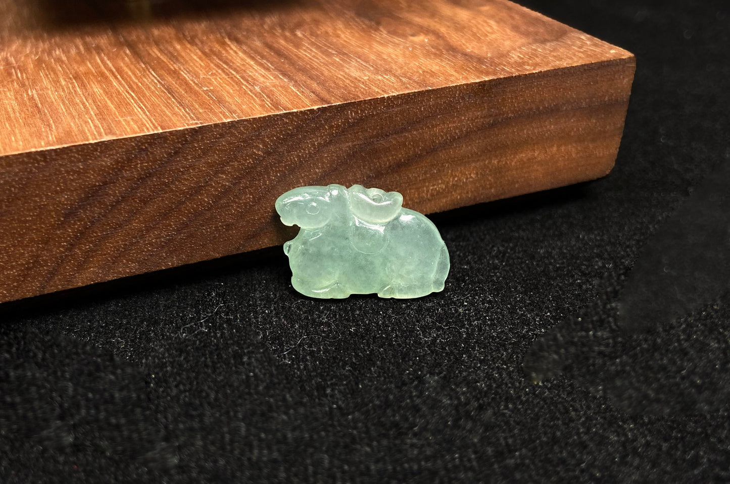 A wispy mint green horse loose jadeite.