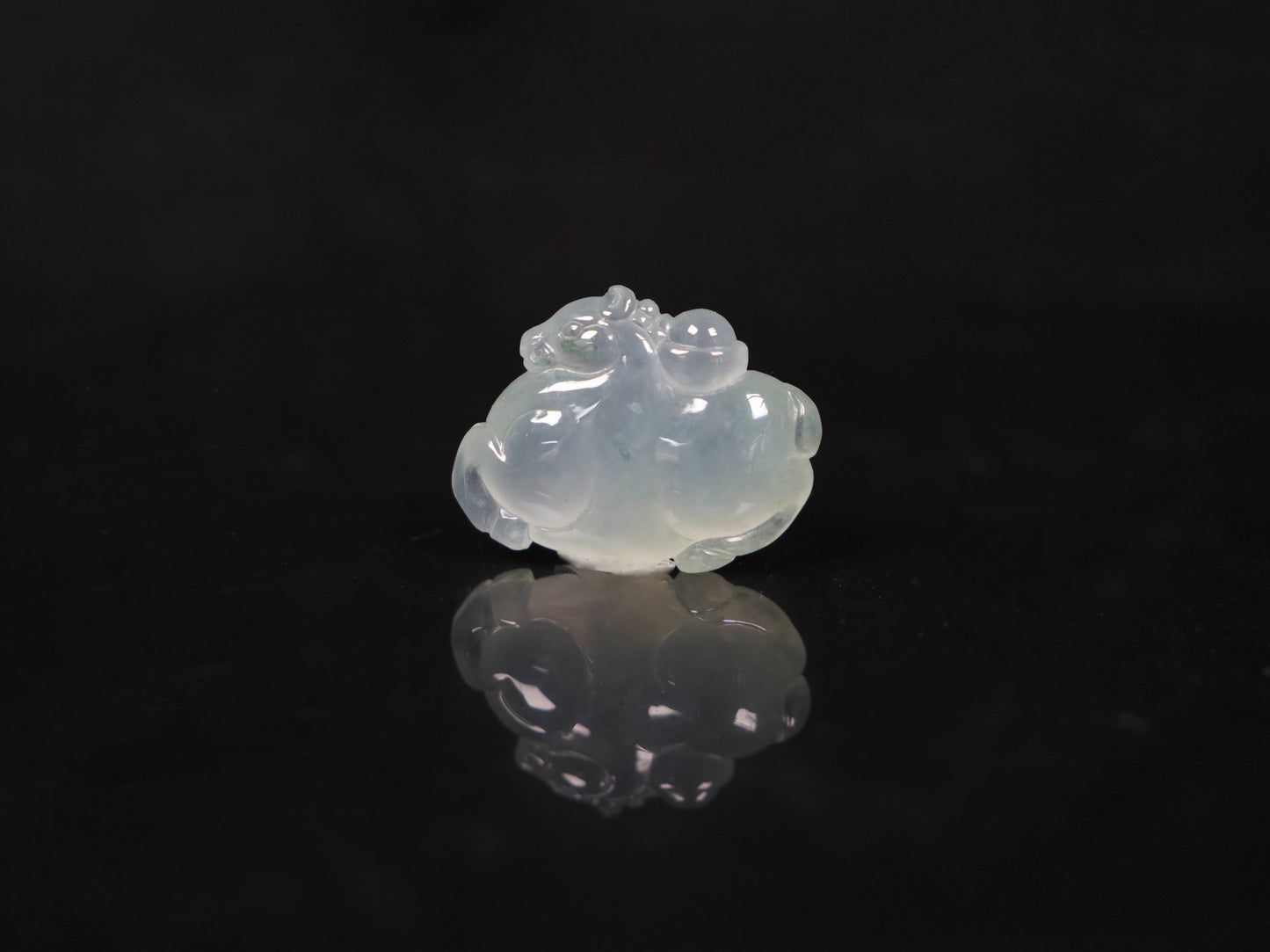 A icy translucent white horse loose jadeite.