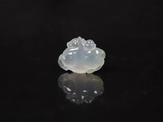 A icy translucent white horse loose jadeite.