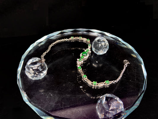 A glacial green dewy jadeite bracelet.