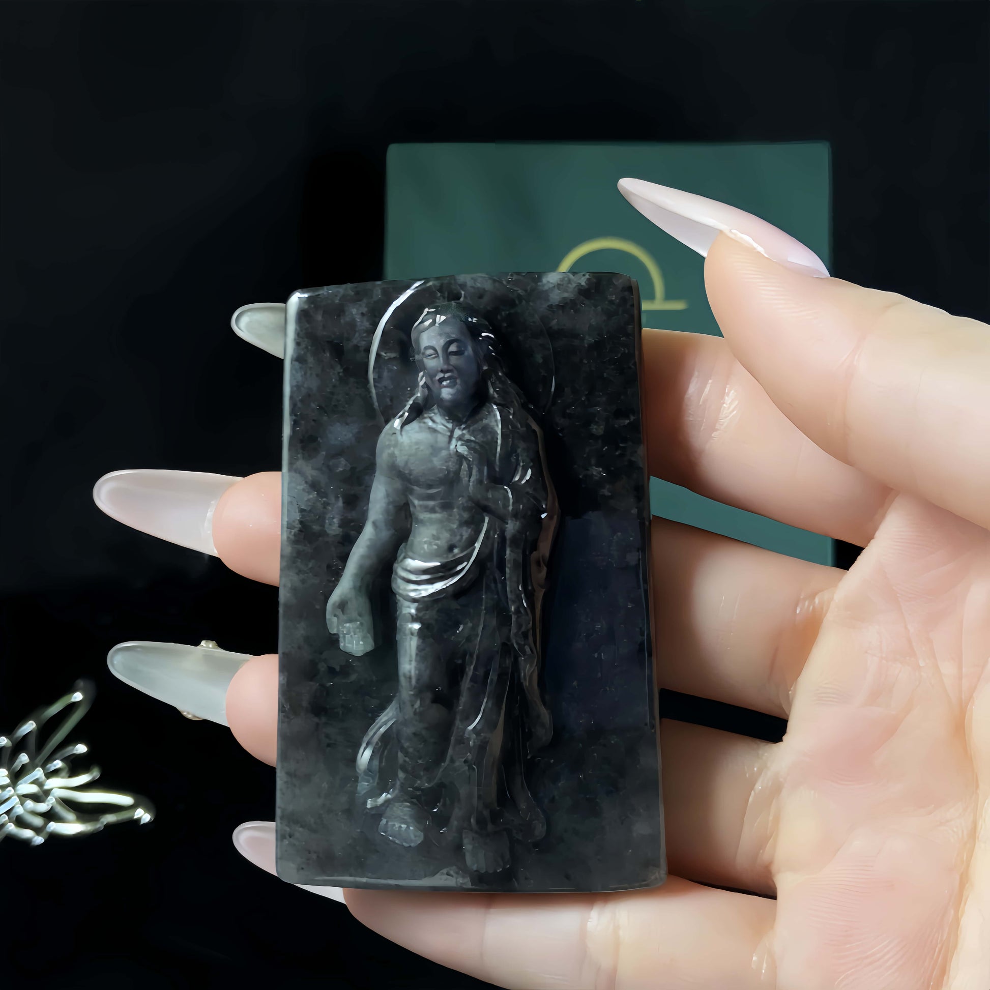 A Wuji divine jesus relief loose jadeite.