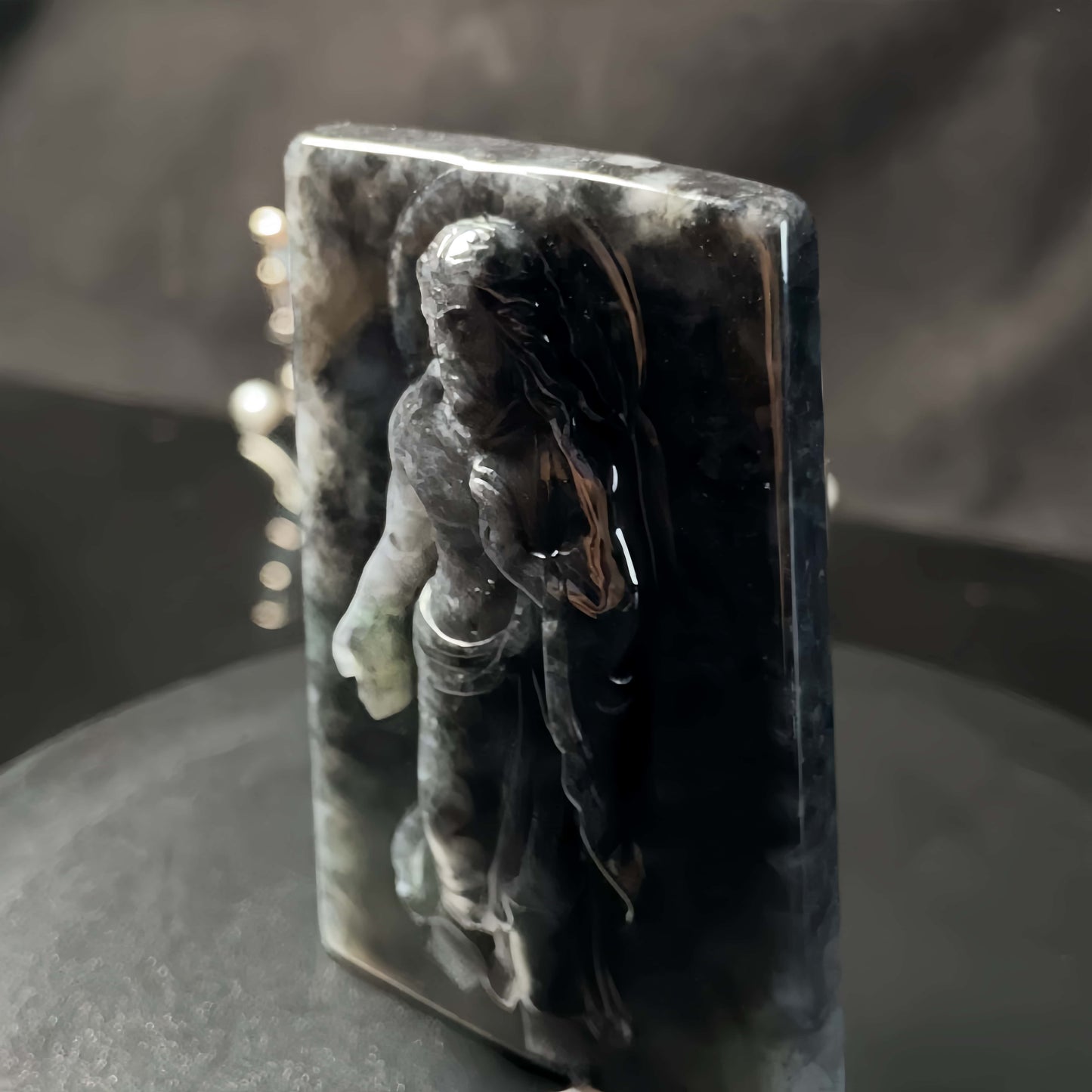 A Wuji divine jesus relief loose jadeite.