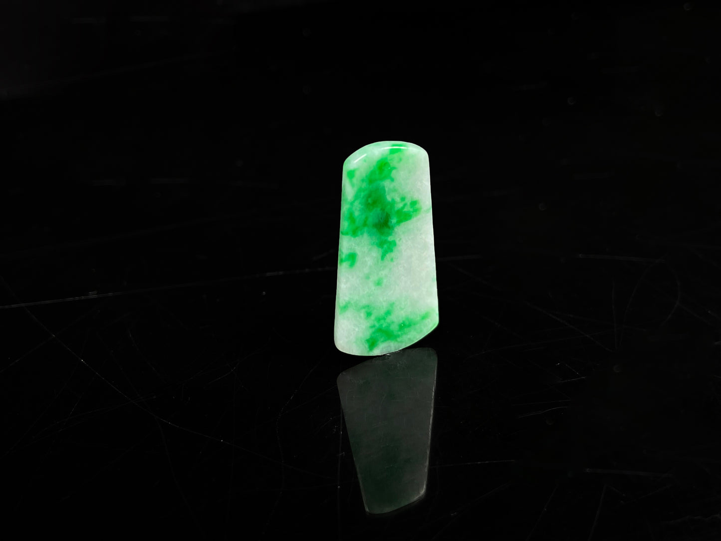 A creamy white Yang Green Wu Shi Pai  loose jadeite.